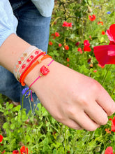 Afbeelding in Gallery-weergave laden, By Trend Armband Nylon Mini Rotate Circles Oranje